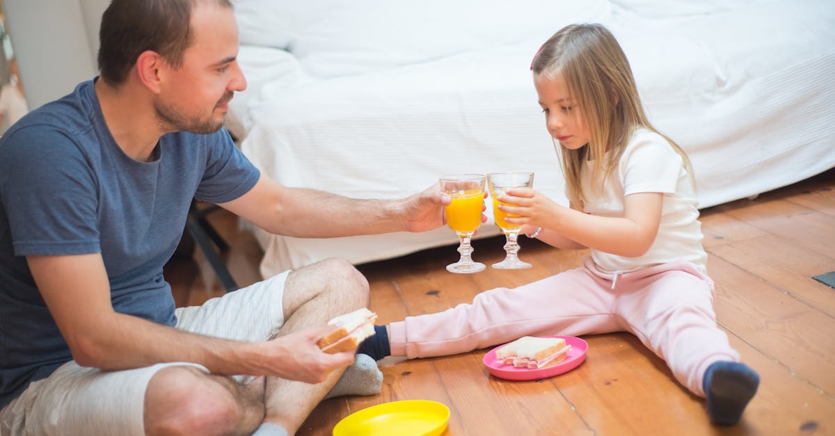 A Father and Daughter Toasting 